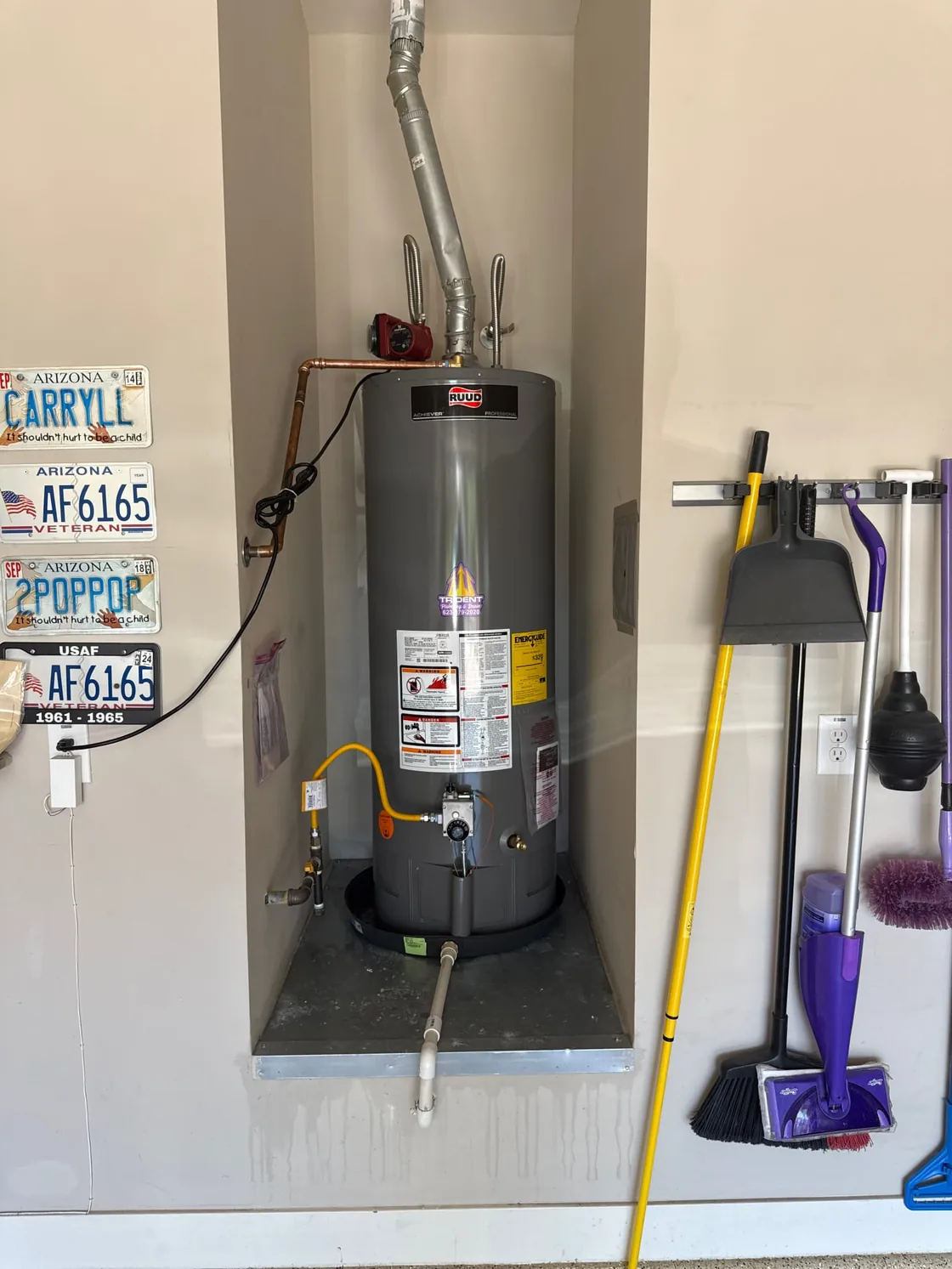 A gas tank water heater with finished connections and venting