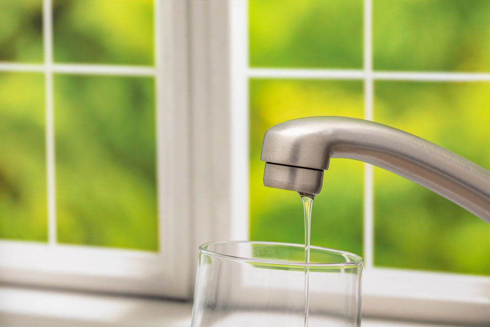 an open faucet with poor water pressure
