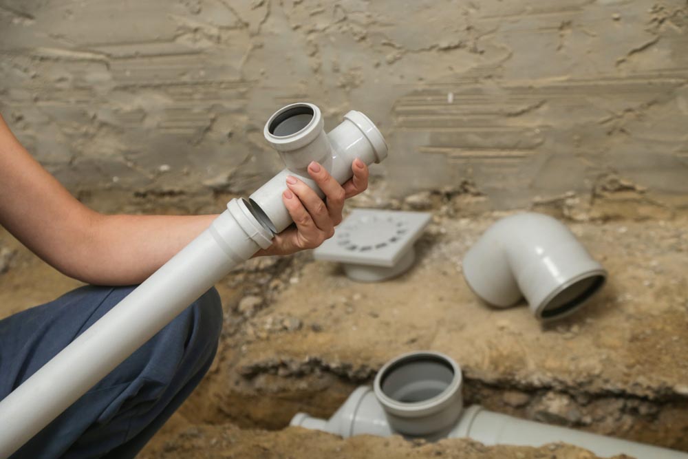 Trident technician working on a repiping project Trident technician working on a repiping project